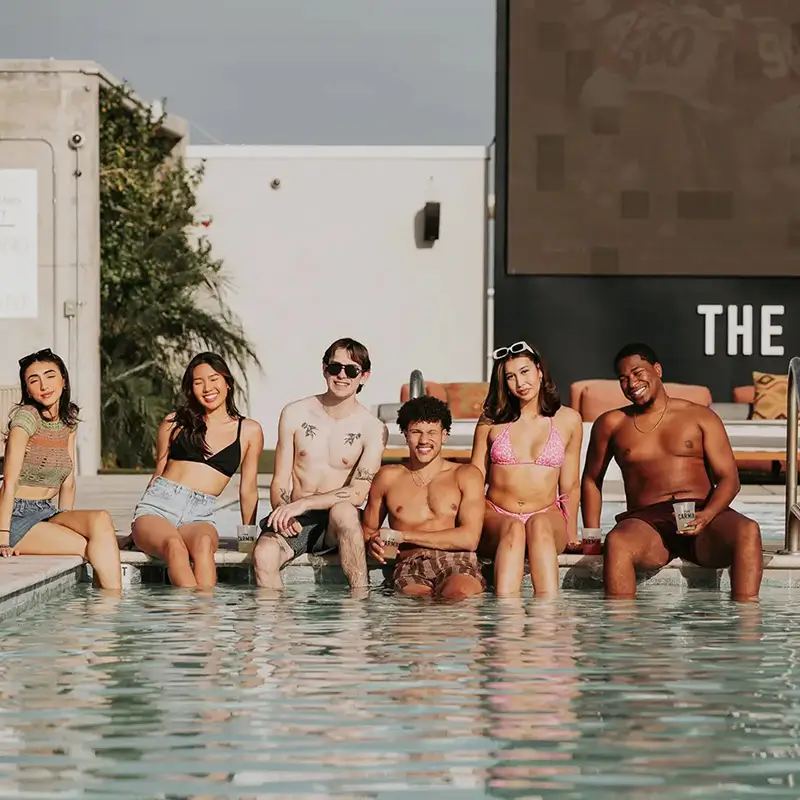 young adults at a pool